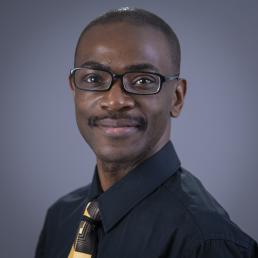 Dr. Michael Opata